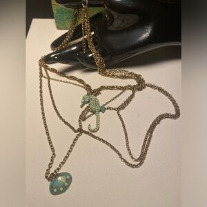 💛💛 Vintage yet new one of a kind gold tone multilayered multi design necklace